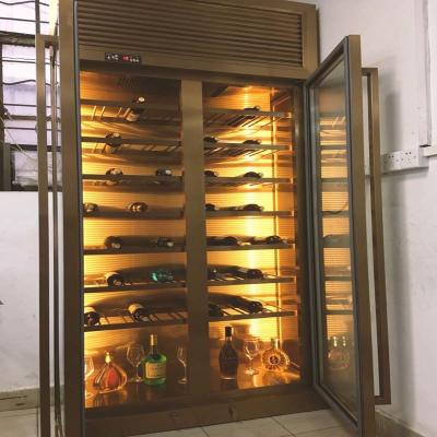 China Customized Rose Gold Stainless Steel Wine Cabinets Luxury Villa Private Display Rack for sale