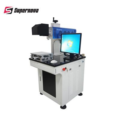 China CO2 Laser Type Laser Marking Machine for Wood and Plastic Engraving for sale