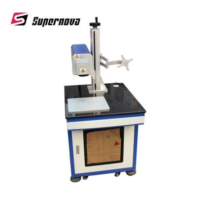China CE FDA Certifications One Year Warranty Free Sample Co2 LaserMarking Machine for sale