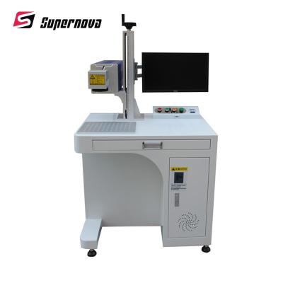 China 10W Co2 Laser Marking Machine with Single Marking Gun Head for Industry for sale