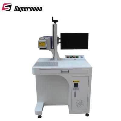 China 3W 5W Plastic UV Laser Marking Machine with Protective Enclosure for sale