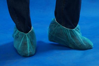 China A sapata descartável do anti pé plástico do deslizamento cobre claro - espessura azul da cor 30gsm à venda