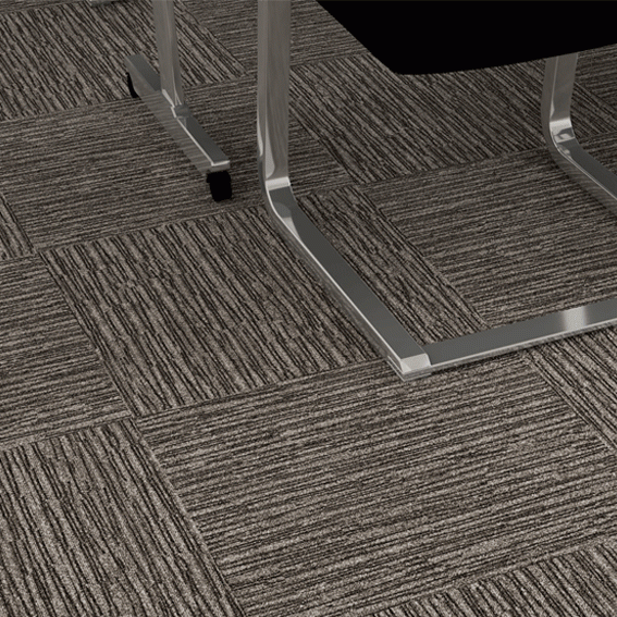 Nylon carpet tile demonstration showing durability and texture
