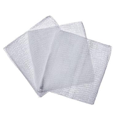 中国 卸し売りカスタマイズされた医学のガーゼの包帯ロール医学の綿の吸収性のガーゼは生殖不能の白い創傷包帯を拭く 販売のため