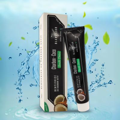 China O OEM orgânico personalizado do dentífrico da pastilha de hortelã ativou o dentífrico do alvejante do carvão vegetal à venda