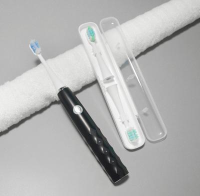 China Wholease dura de largo el cepillo de dientes eléctrico del recordatorio elegante recargable de la prenda impermeable IPX7 con la cabeza de 4 cepillos en venta