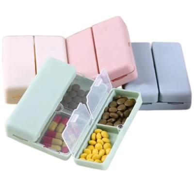 China Portable  Mini Pill Box Weekly Travel Case Pill Storage Organizer with 7 compartmens for sale