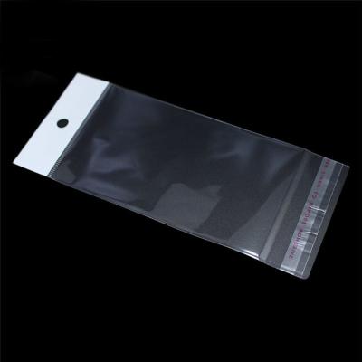 China Custom clear sealed self plastic Self-adhesive seal cardboard header opp bag for sale