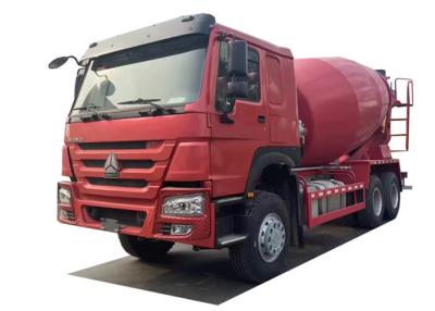 China camión usado rojo del mezclador concreto 12cbm con la bomba Sinotruk HOWO en venta