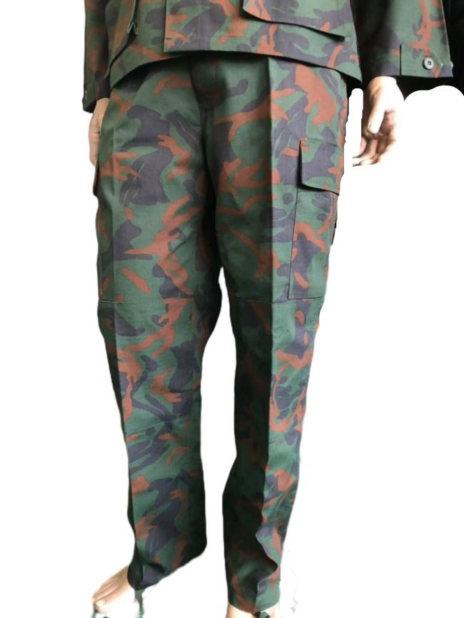 Side view of woodland camo BDU military uniform