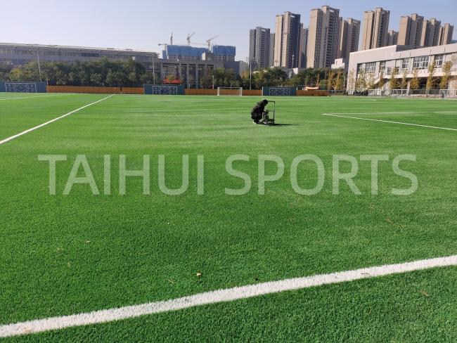 Completed shock pad installation on sports field