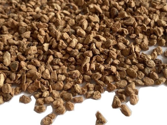 Cork infill granules for artificial turf systems