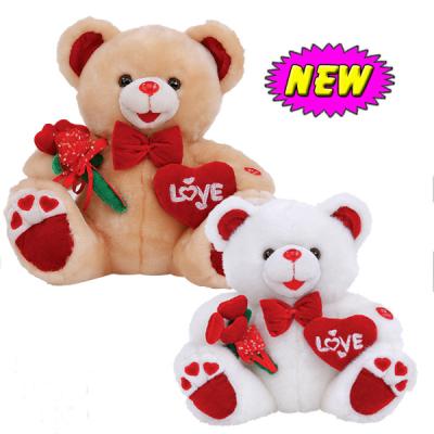 China oso de peluche del día de tarjetas del día de San Valentín 12inch con la flor y los juguetes rellenos corazón del empuje para la celebración en venta