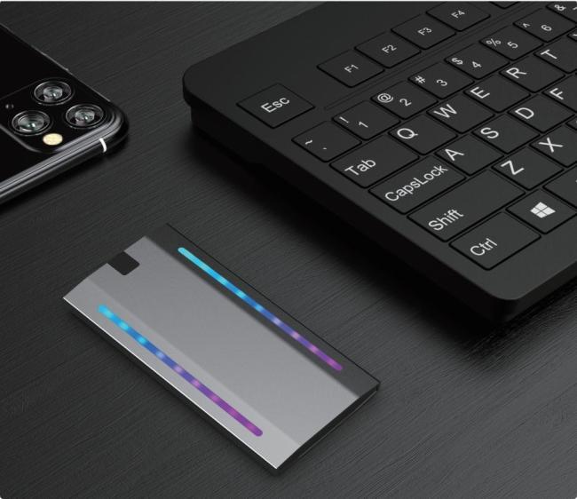 RGB Lighting Effect M. 2 SSD Mobile SSD Supports SATA and Mvne Protocols5gbps/10gbps Transmission Rate Glass Panel with Seven Colours RGB Light Effect