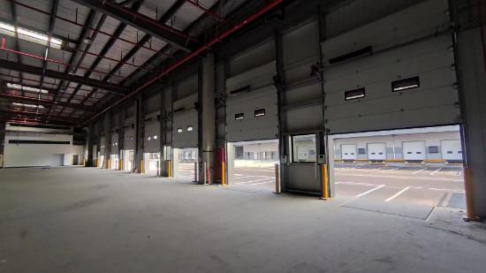 Quality Logistics Insulated Sectional Door Industrial Warehouse Doors for sale