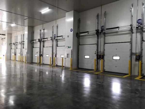 Quality Logistics Insulated Sectional Door Industrial Warehouse Doors for sale