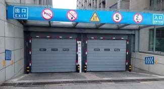 China Customizable High Speed Spiral Door Parking Lot Entrance And Exit Door for sale