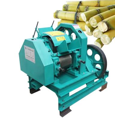 China 1000kg/H Small Sugar Cane Squeezer Vertical Sugarcane Juice Crusher Machine for sale