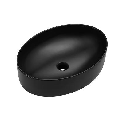 China Lavabo oval de la encimera de la forma, lavabo de lavado a mano de cerámica negro en venta