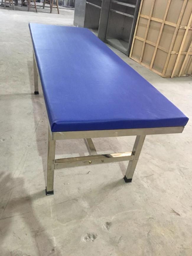 Medical examination cot in clinical setting