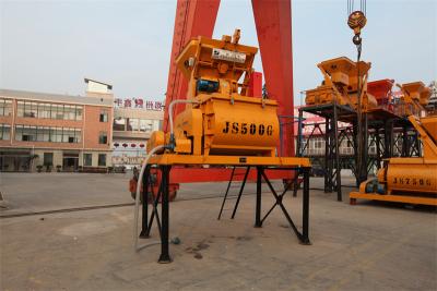 中国 Twin Shaft JS1000 1m3 Volume Cement Mixer Machine Electric Self Loading Concrete Mixer 販売のため