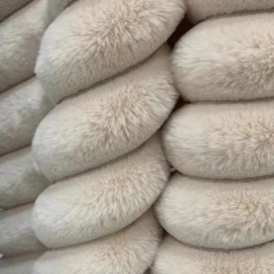 China Orange Cream Fluffy Fabric Material Blanket Fuzzy Upholstery Fabric for sale