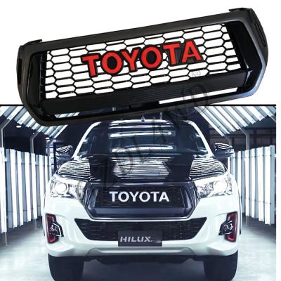 China Imitaion Carbon Fiber Front Grill Bar Toyota Hilux TRD Logo Rocco 2018 2019 for sale