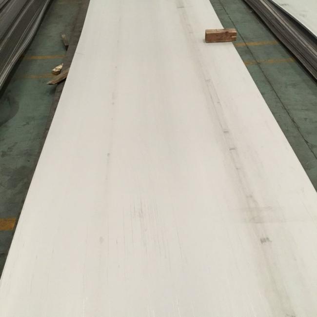 Industrial stainless steel sheets stacked and ready for shipment
