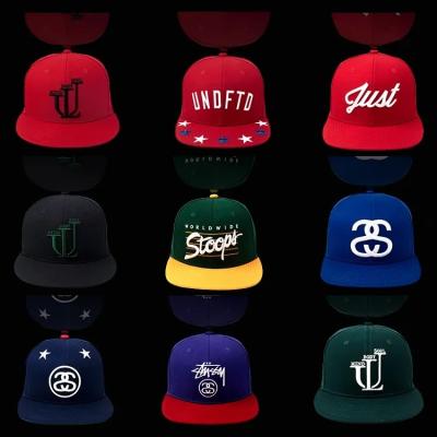 China Custom 3d Puff Embroidery Flat Brim Snapback Hats Black Red Blue Color for sale