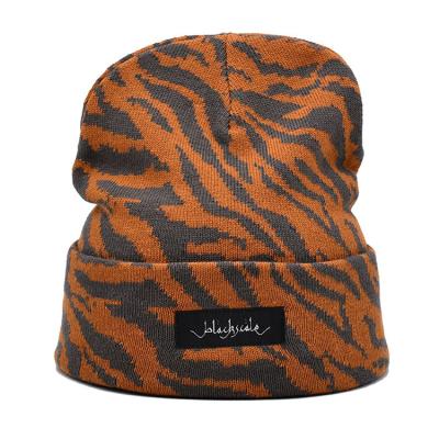China Hot selling custom logo acrylic jacquard wool hat with warm and windproof knitted hat for sale