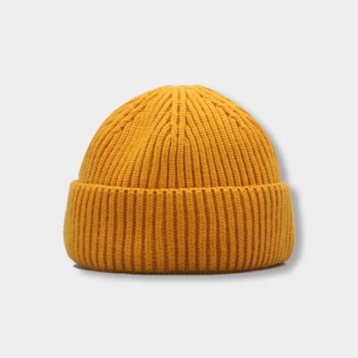 中国 男女兼用のHeadwearのためのODMの冬によって編まれる帽子は暖かいHip Hop様式の通りを偶然保つ 販売のため
