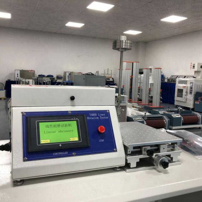 Close-up view of UP-1012 Linear Abrasion Resistance Tester testing mechanism and controls