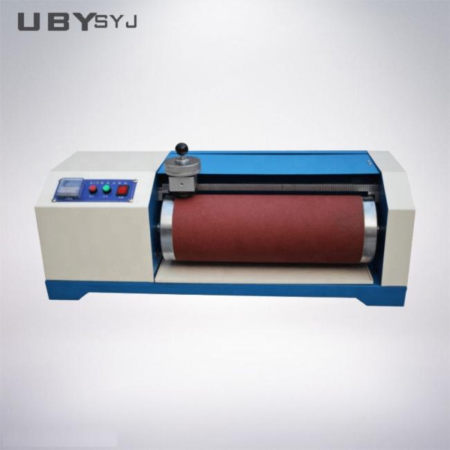 DIN Abrasion Tester front view showing control panel and testing mechanism