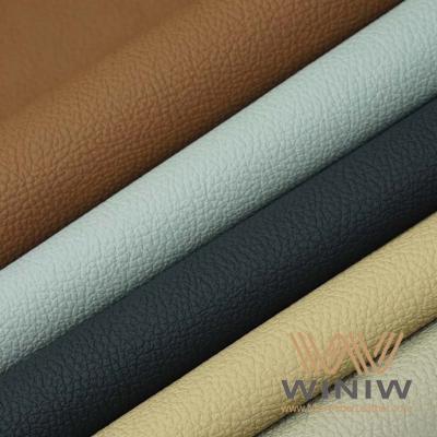 China 1.2mm PU Automotive Synthetic Leather Seat Fabric Orange Black Brown Color for sale