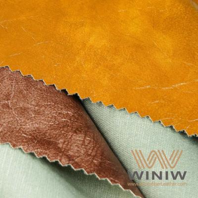 Chine Lissez le cuir et Eau-résistez au tissu en cuir de PVC pour l'habillement de tapisserie d'ameublement enduit d'une couche protectrice à vendre