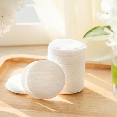 China La cara orgánica suave blanca pura del algodón rellena la alta absorción para el uso cosmético en venta