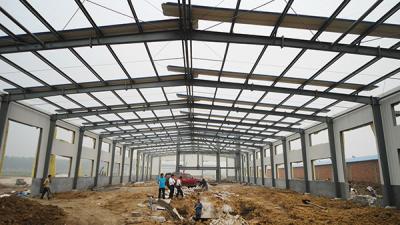 China Hot Dip Galvanized Prefabricated Building Prefab Warehouse Building Q355B for sale