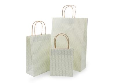 China Luxury Die - Cut Silver Christmas Gift Bags With Twisted Handles OEM Service for sale