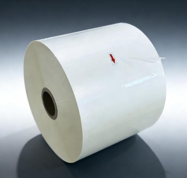 Laminating film application process on book covers