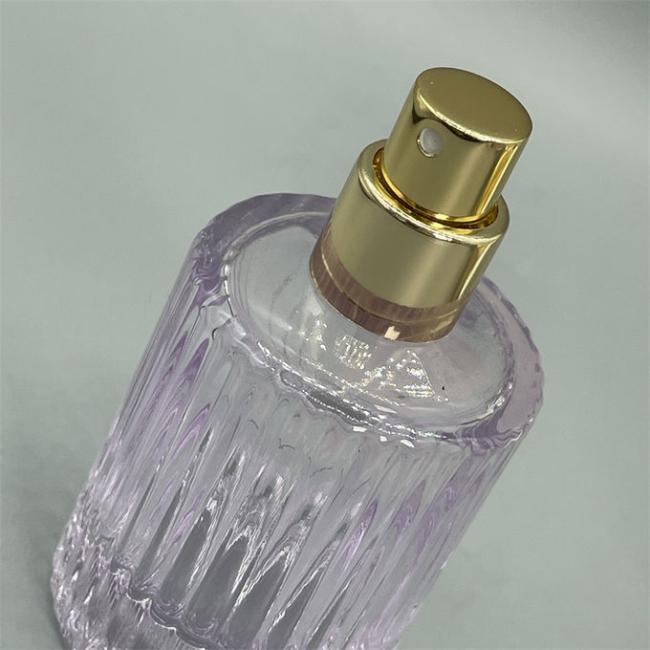 Close-up view of perfume spray pump mechanism and nozzle
