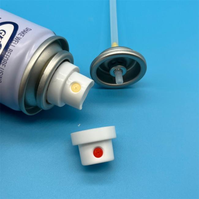Precision dry shampoo aerosol valve close-up view showing nozzle design