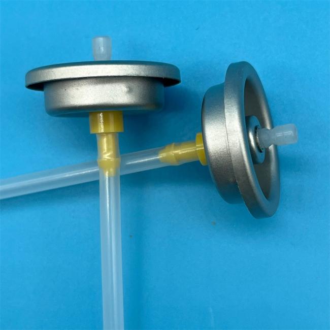Dry shampoo valve assembly showing internal components and construction
