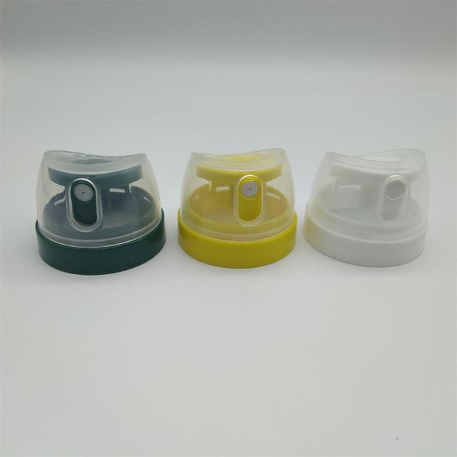 Industrial aerosol spray cap showing secure locking mechanism and ergonomic design
