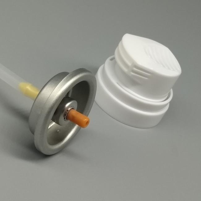 Shaving foam valve components showing internal mechanism