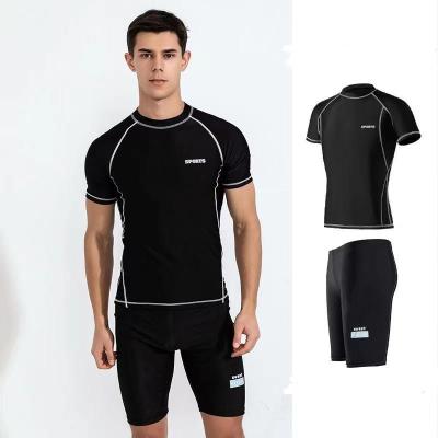 China Simple Two Piece Mens Swimsuit Short Sleeved Male Swimming Costume for sale