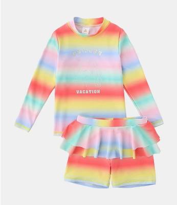 中国 虹は帽子の夏のビキニが付いている女の子の水着のビキニの女の子の水泳のスカートを印刷した 販売のため