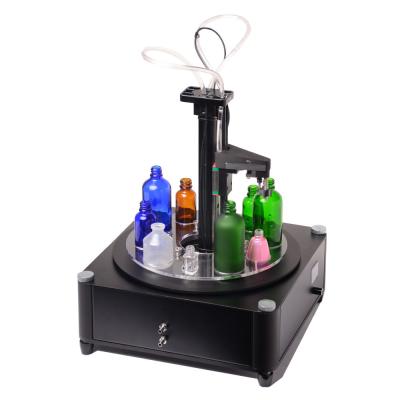 China Automatic Perfume Filling Machine Essential Oil Small Cosmetic Bottle Filling Machine for sale