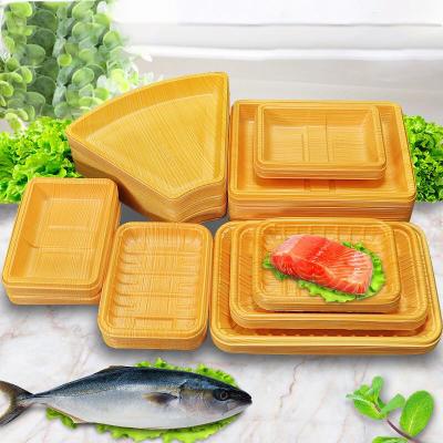 China Wood Grain Color Salmon Disposable Plastic Meal Tray for sale