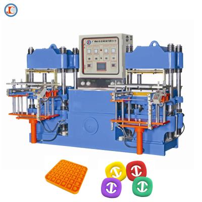 Chine 2.5M machine à moules à double moule à vulcanisation en silicone pour le jeu de fidget à billes de stress à vendre