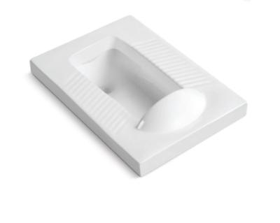 China Ivory Squat Pan Toilet Porcelain Squat Toilet 300mm 400mm Roughing In for sale